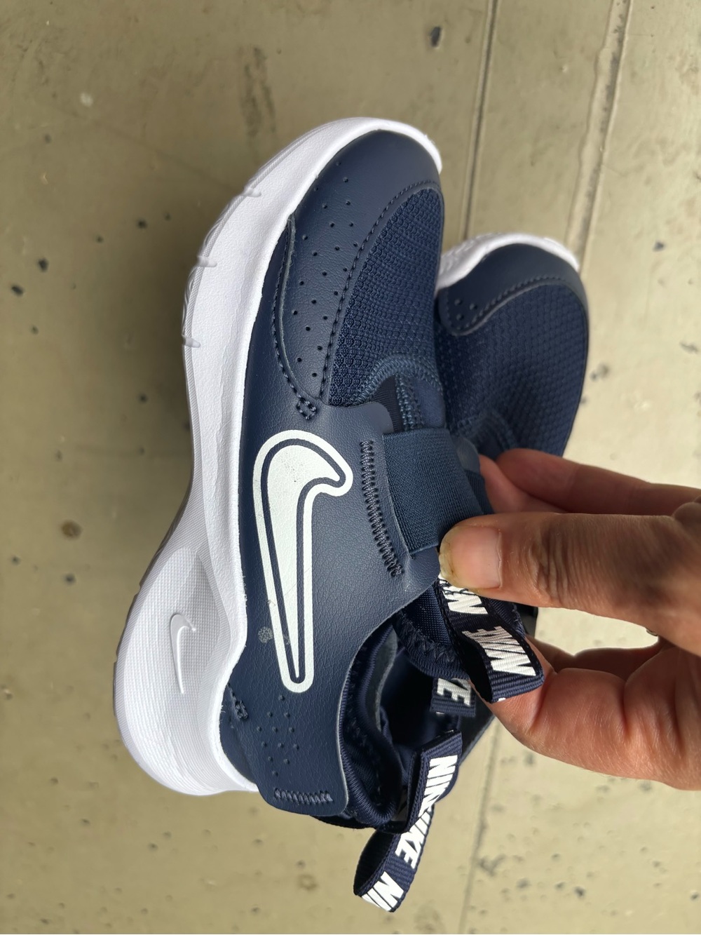 Nike Kids Navy and White Slip-On Athletic Sneakers with Hook Tab